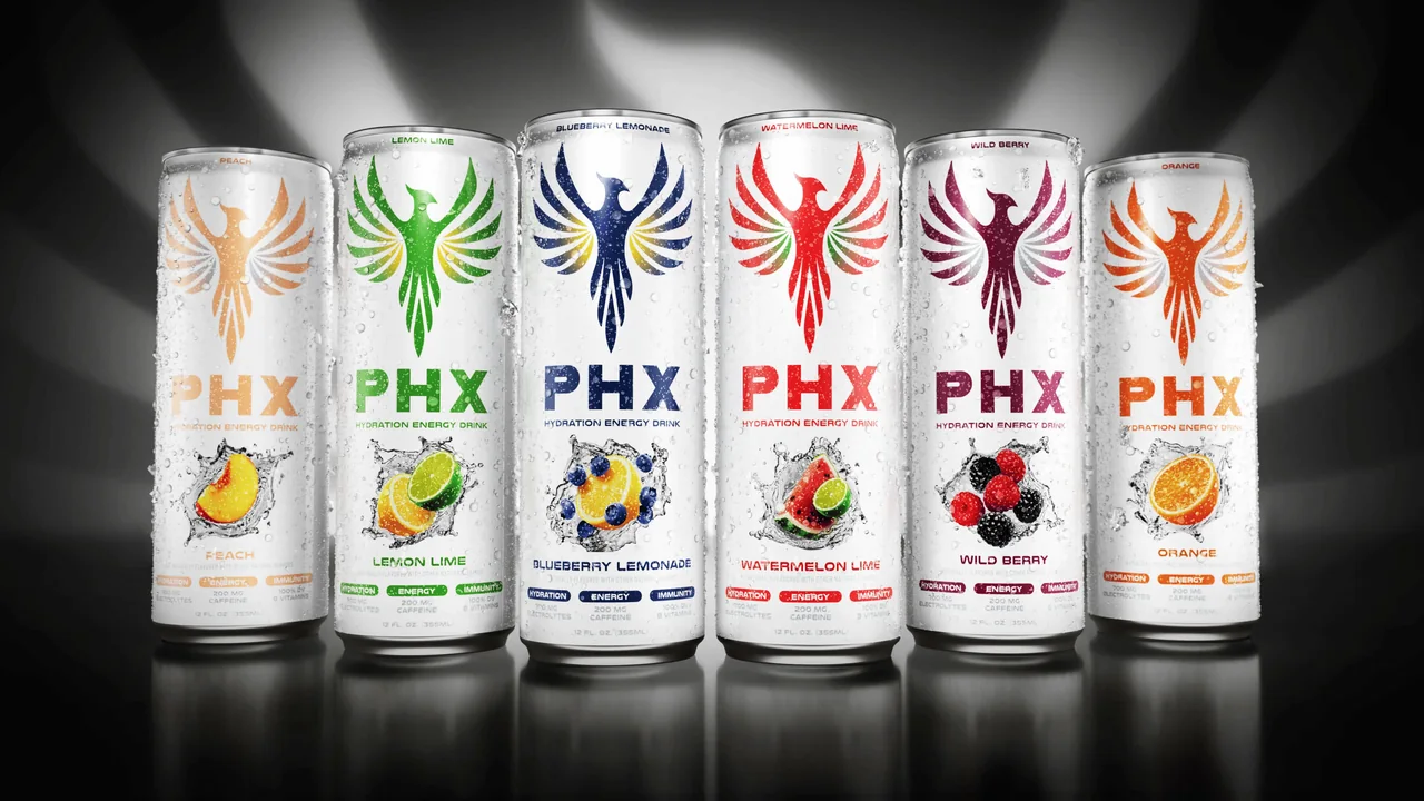 Six PHX Energy Drink cans with distinct flavor colors on a dark studio background
